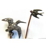 A Victorian stick pin bird in flight set white stones and another swallow