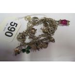 Two silver charm bracelets and charms