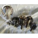 Five Victorian horseshoe shaped stick pins