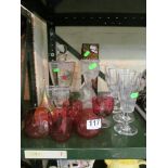 A pair of opaque glass candlesticks ladies and other glass