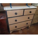 A painted Victorian chest of two short and two long drawers