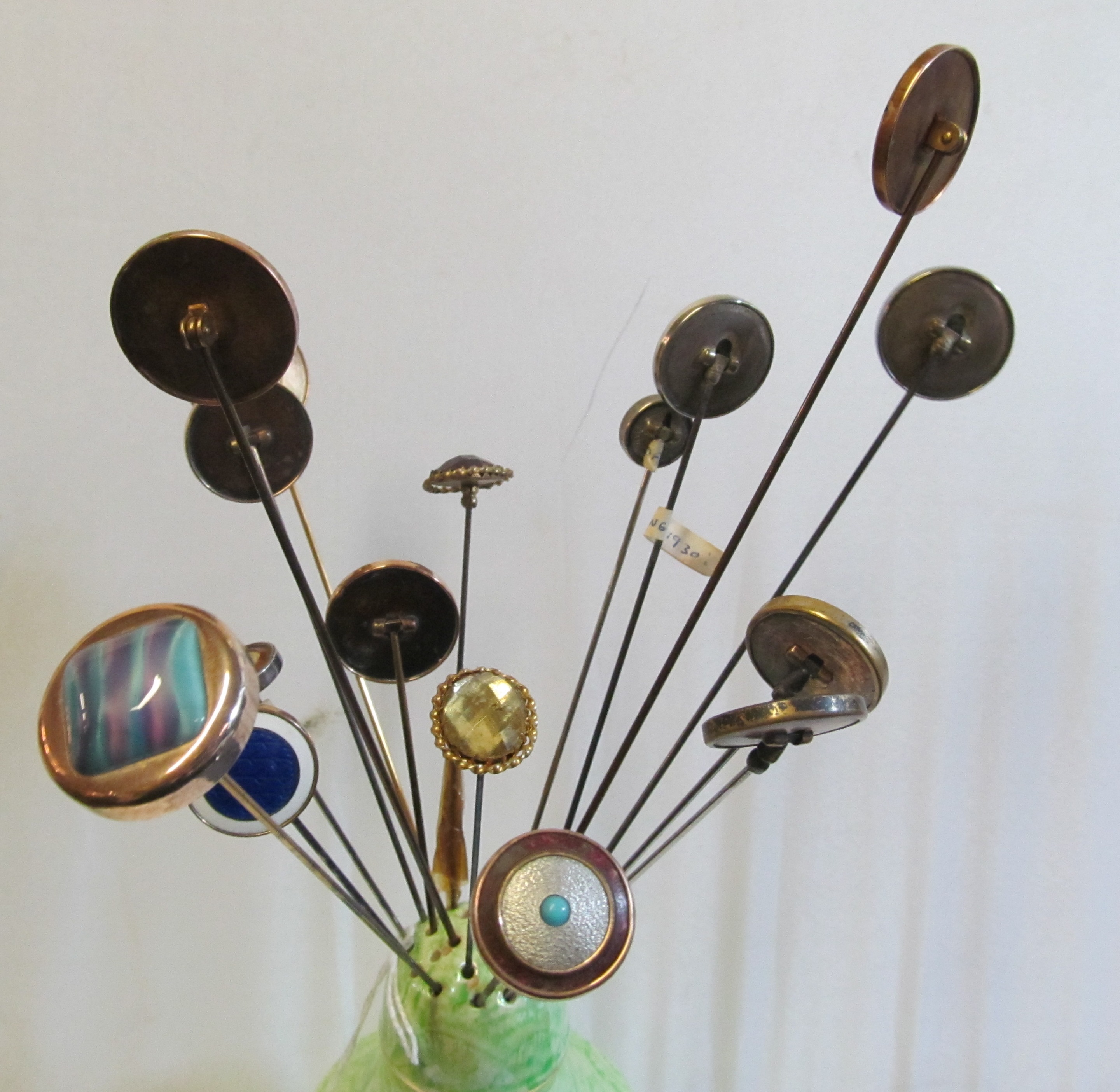 A group of hat pins with button style swivel ends in hat pin holder - Image 2 of 2