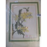 An oriental print yellow flowers, and an oriental scroll.