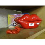 A Babsong telephone in shape of lips, boxed