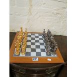 A modern chess set figures dipped in silver and gold