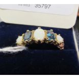A 9ct gold opal and blue five stone ring