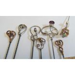 seven silver, gold and other swirl pattern Edwardian and later hat pins