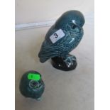 A Poole pottery large owl and another smaller