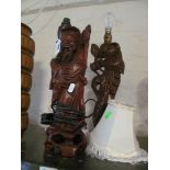 A carved Chinese figure lamp and another