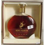 A large bottle of Remy Martin Fine Champagne Cognac in presentation box