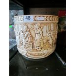 A Bretby jardinière cream and brown with raised design of Dutch children