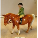 A Beswick girl on horse