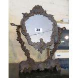 A brass cherub mirror (glass a/f)