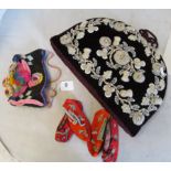 A velvet and beadwork tea cosy, two pairs embroidered oriental shoes and a knitted tea cosy
