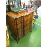 A walnut crossbow chest of four drawers