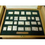 A cased set of silver replicas 'The Stamps of Royalty' in original packaging