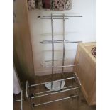 A towel rail, shoe rack and clothes rail