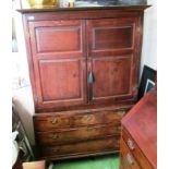 A 19th Century Welsh cabinet with two panelled cupboards, three short and two long drawers