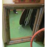 A large metal clad eastern style mirror