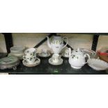 Three part tea and coffee sets, a stand and plates