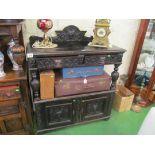 A Victorian carved oak buffet