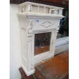 A small white cabinet