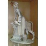 A Lladro group girl with cow (ear a/f)