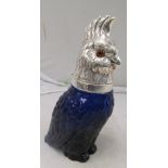 A blue glass parrot with silver-plated hinged head