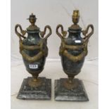 A pair of marble urn shaped table lamps with bronze fittings and scroll handles on square bases