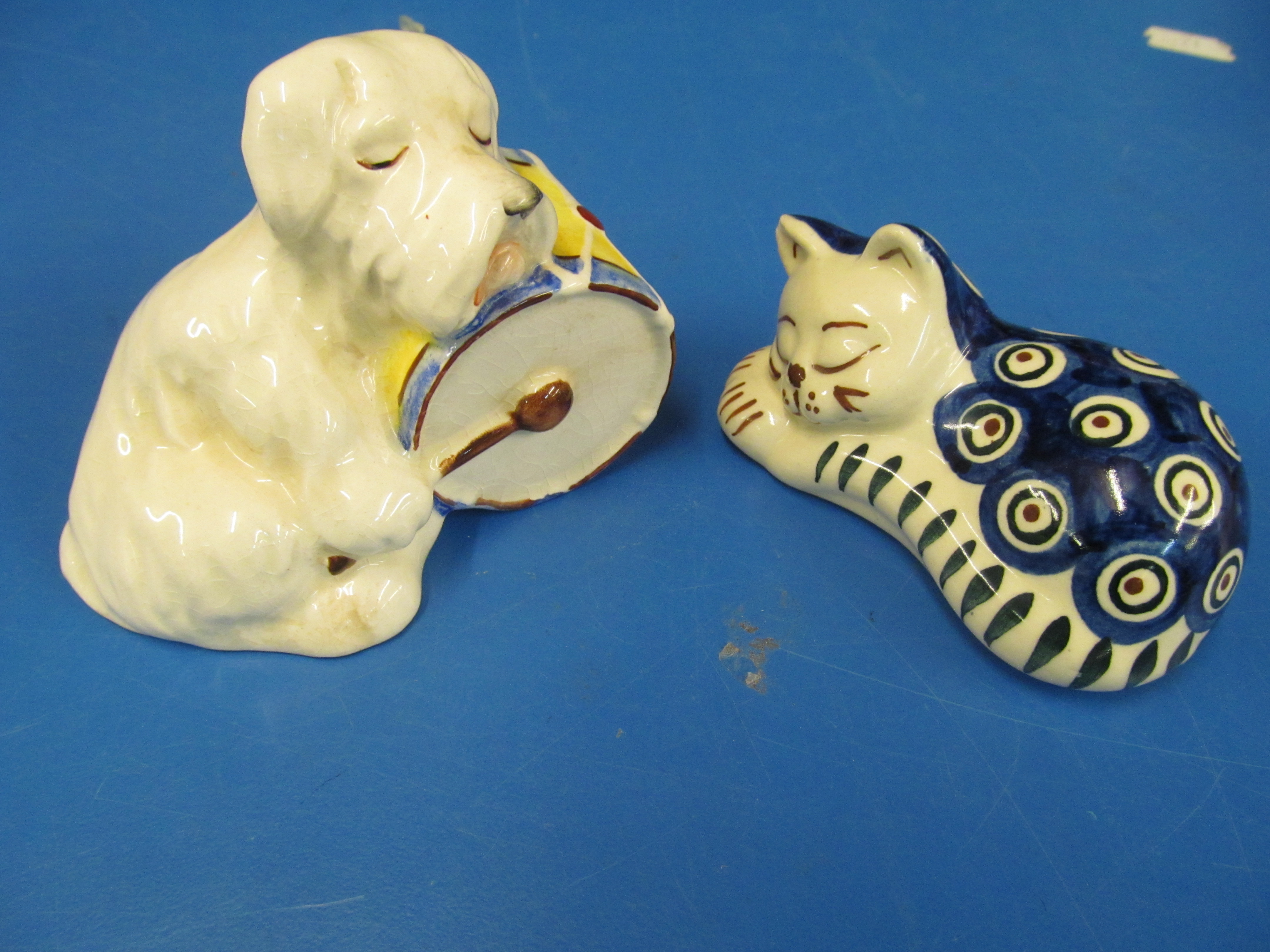 A Beswick dog with drum and Polish cat