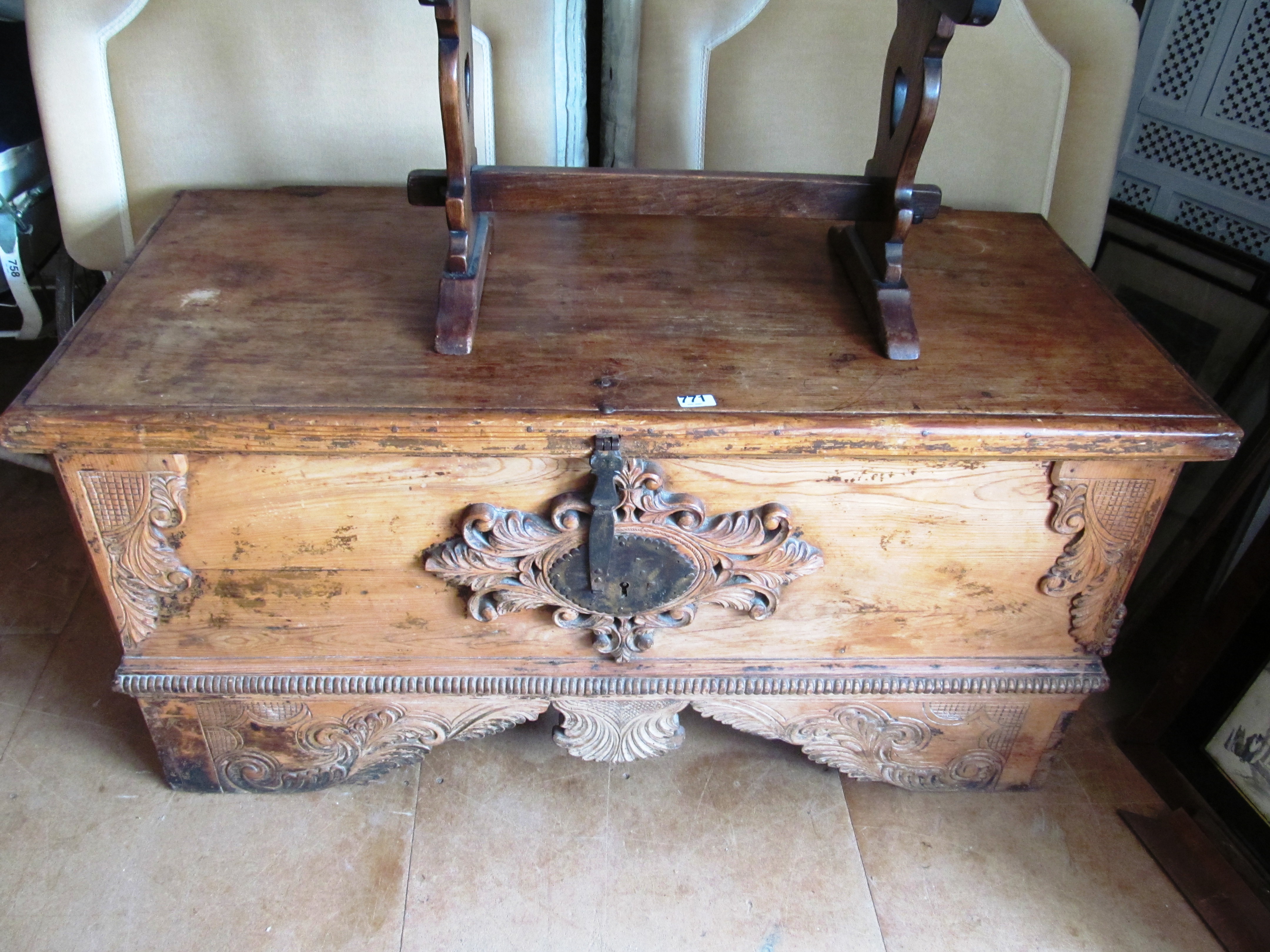 A large carved coffer.