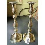 A pair of silver candlesticks