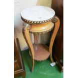 A mahogany marble top jardinière stand