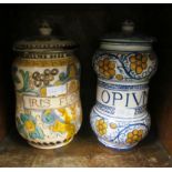 An Italian pottery lidded drug jar Iris Florentina and another