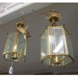 Two brass and glass ceiling lanterns