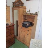 A small Victorian pine wardrobe mirror door with shelf, two drawers and cupboard to side