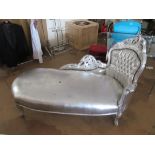 A silver painted chaise longue on cabriole legs