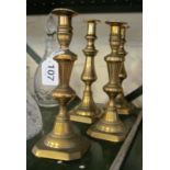 Two pairs brass candlesticks