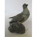 A Bergman cold-painted inkwell as game bird with hinged neck on naturalistic base, inscribed