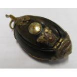 A Coquilly nut snuff box as grenade