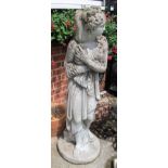 A reconstituted stone garden figure of a classical lady