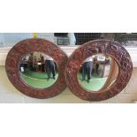 A pair of copper embossed mirrors