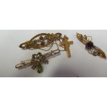 A late Victorian 15ct gold ties ribbon seed pearl and peridot brooch, two other brooches and a cross