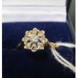 An 18ct gold diamond cluster ring