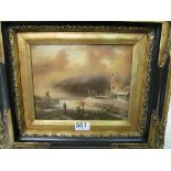 An oil on board Dutch frozen river scene with windmill in black and gilt frame