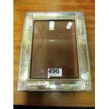 A rectangular silver photo frame