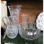 A glass vase and jug, bowl and two vases