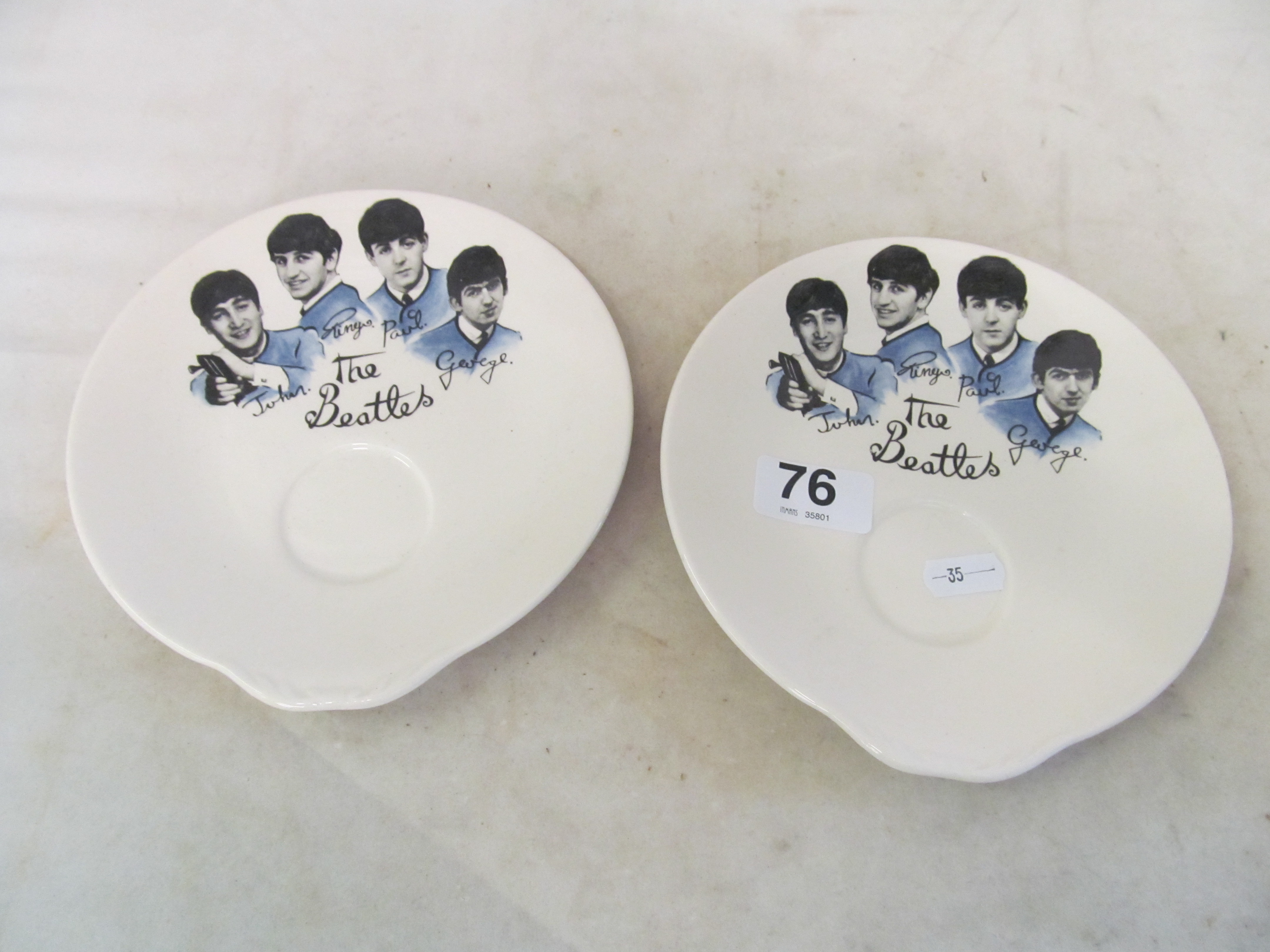 Two Washington Pottery Beatles saucers