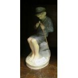 A Royal Copenhagen figure sailor boy mending rope