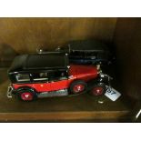 A Franklin Mint 1935 Mercedes Benz and a 1929 Rolls Royce Phantom